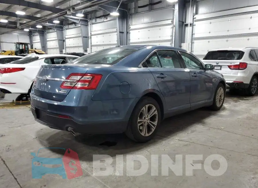 1FAHP2E82JG134984 Photo# 3