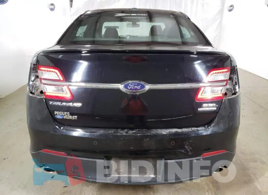 1FAHP2E81JG137973 Photo# 6