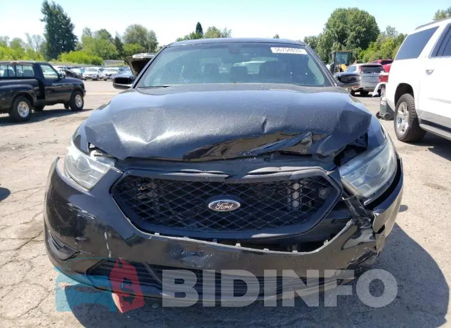 1FAHP2E87EG138051 Photo# 5