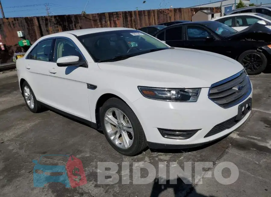 1FAHP2E84FG134136 Photo# 4