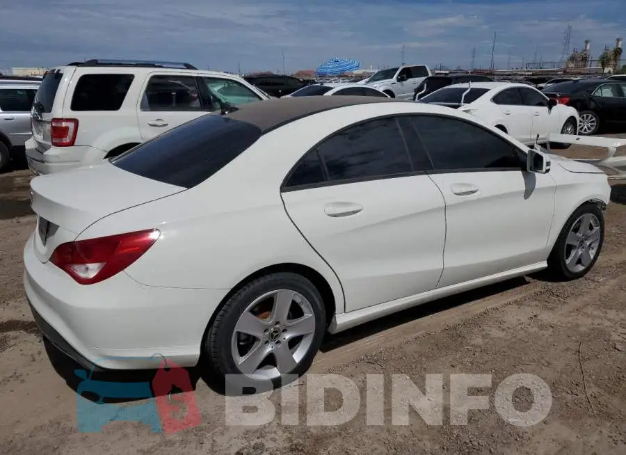 WDDSJ4EB1JN586094 Photo# 3