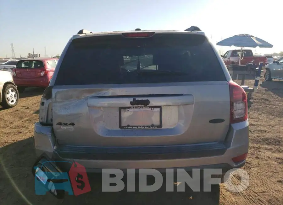 1C4NJDEBXGD631684 Photo# 6