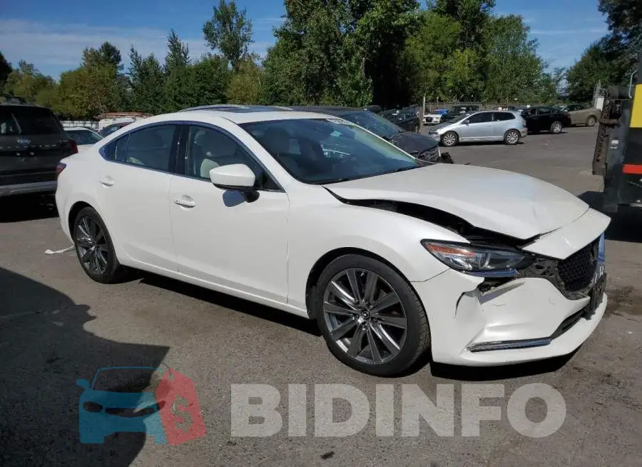 JM1GL1WYXJ1300696 Photo# 4
