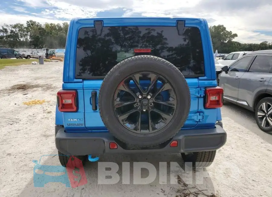 1C4JJXP65PW555117 Photo# 6