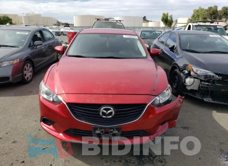 JM1GJ1V60E1144129 Photo# 5