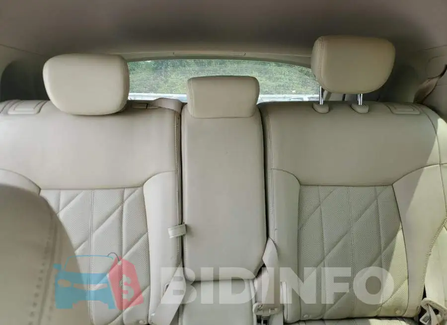 JN8CS1MUXFM382196 Photo# 10
