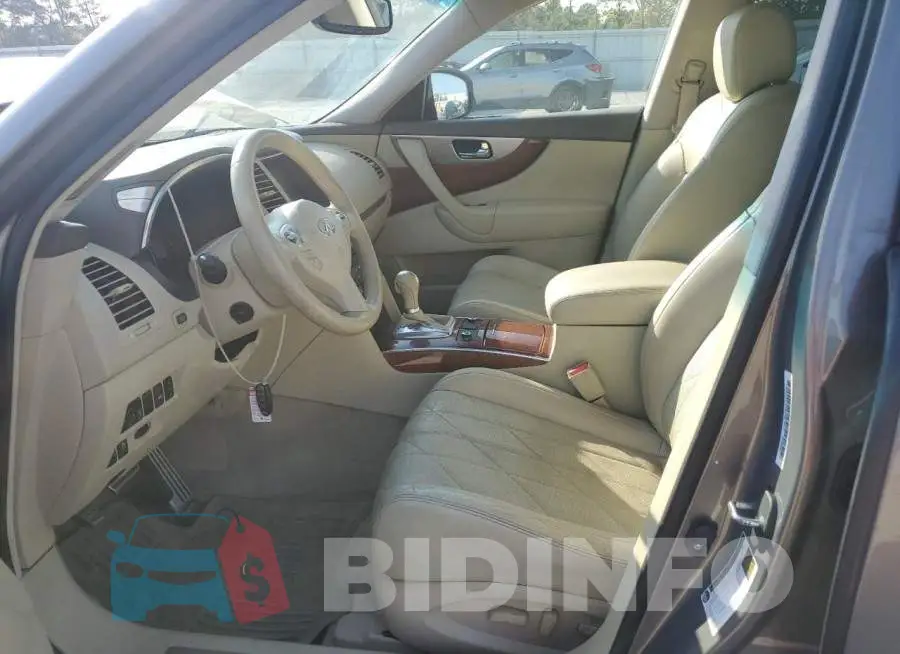 JN8CS1MWXFM480596 Photo# 7