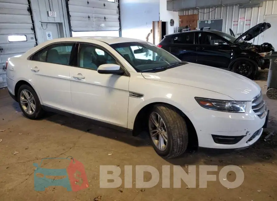 1FAHP2E86FG209063 Photo# 4