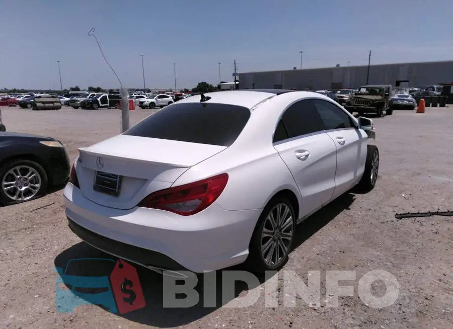 WDDSJ4EB1JN656418 Photo# 4