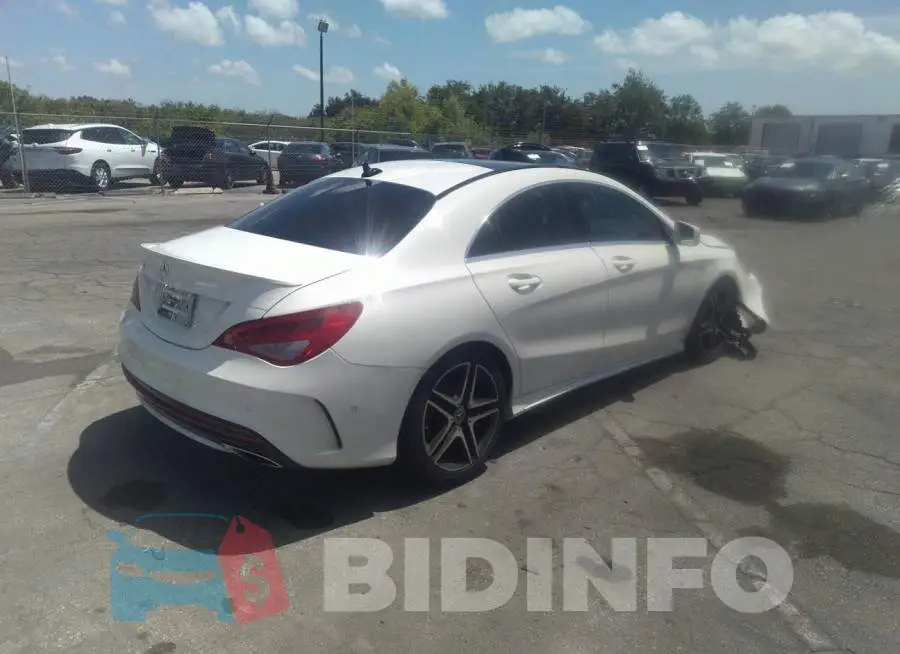 WDDSJ4EB1JN583244 Photo# 4