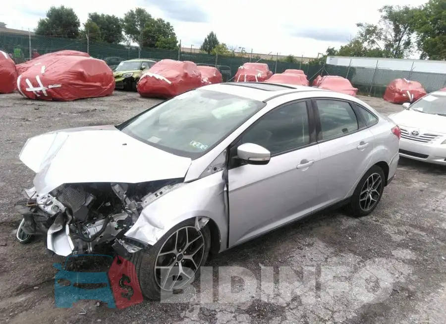 1FADP3H28JL219606 Photo# 2 1FADP3H28JL219606 Photo# 2