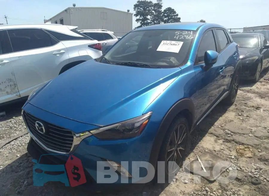 JM1DKBD78G0114286 Photo# 2