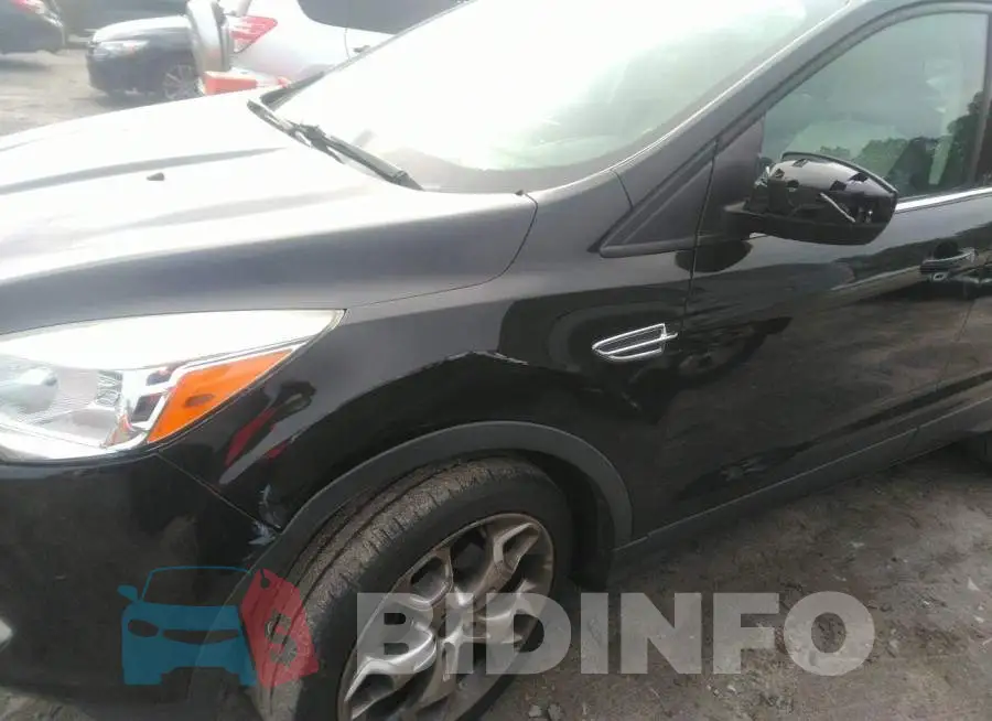 1FMCU0JX2EUA74884 Photo# 5