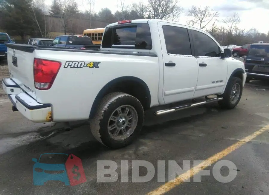 1N6BA0EC6DN301712 Photo# 4