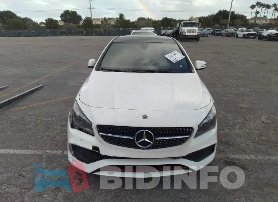 WDDSJ4EB2JN674796 Photo# 6