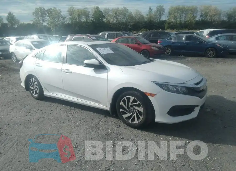 19XFC2F79JE209084 Photo# 1