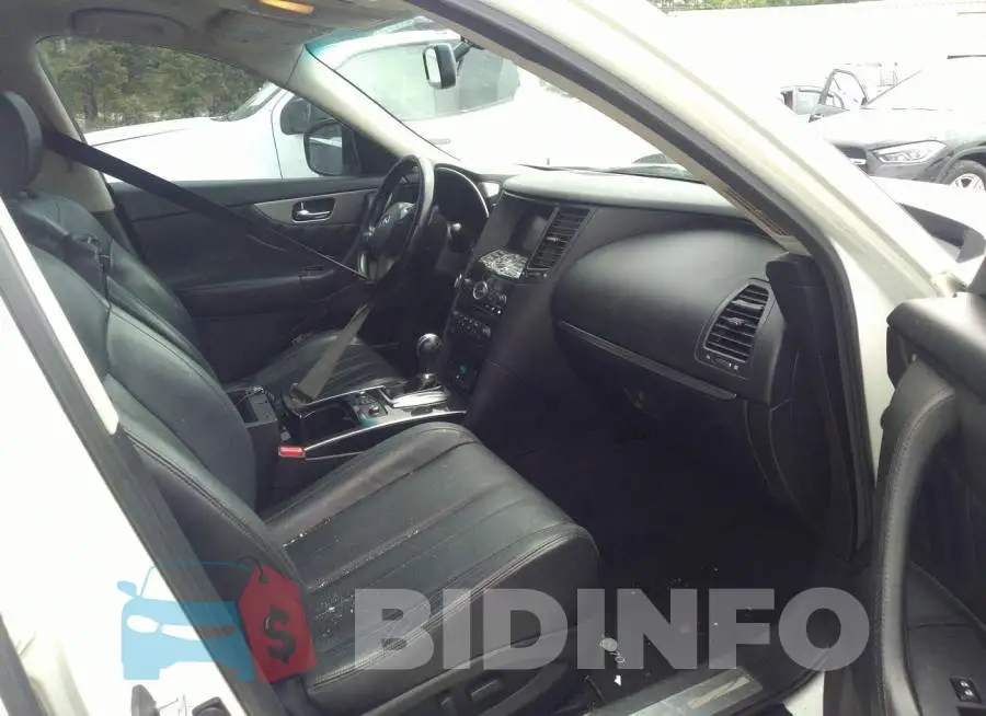 JN8CS1MU3EM450983 Photo# 5