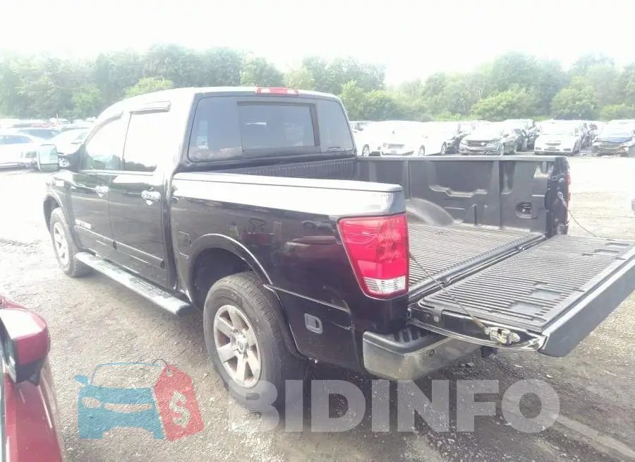 1N6AA0EC5FN504136 Photo# 3