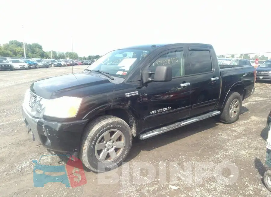 1N6AA0EC5FN504136 Photo# 2