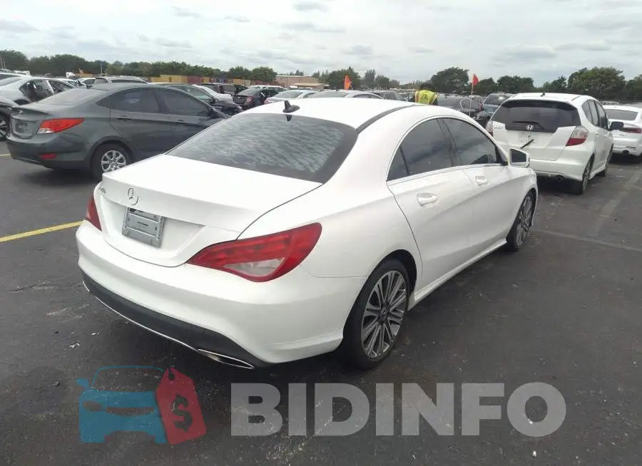 WDDSJ4EB0JN657592 Photo# 4