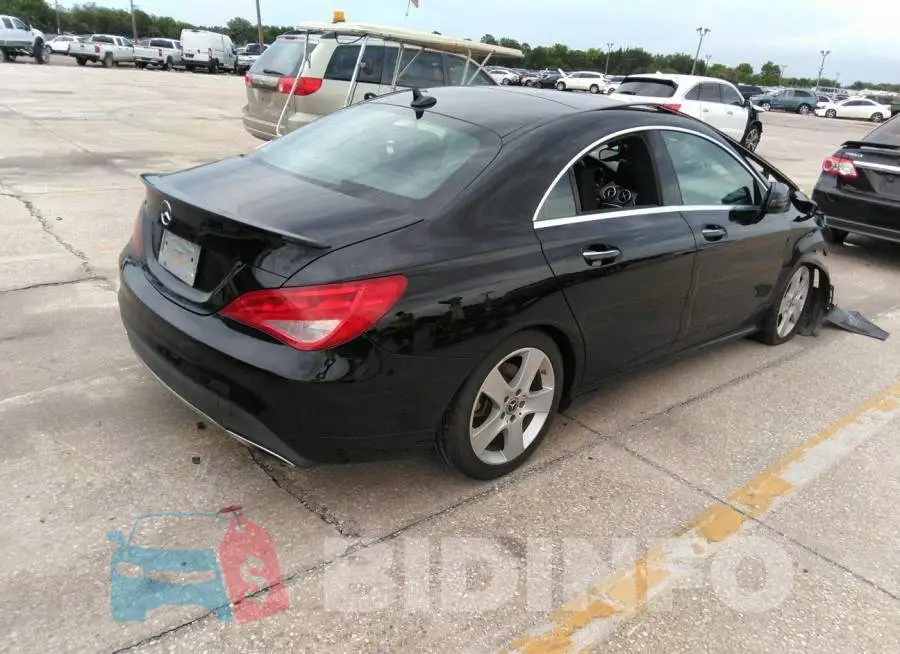 WDDSJ4EB6JN559375 Photo# 4