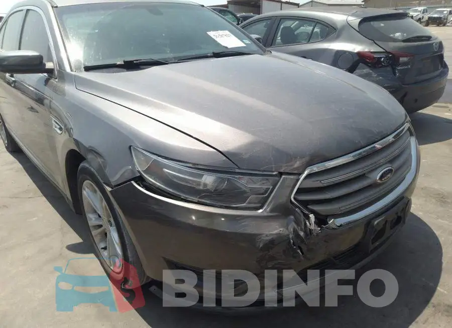 1FAHP2E86EG185054 Photo# 6