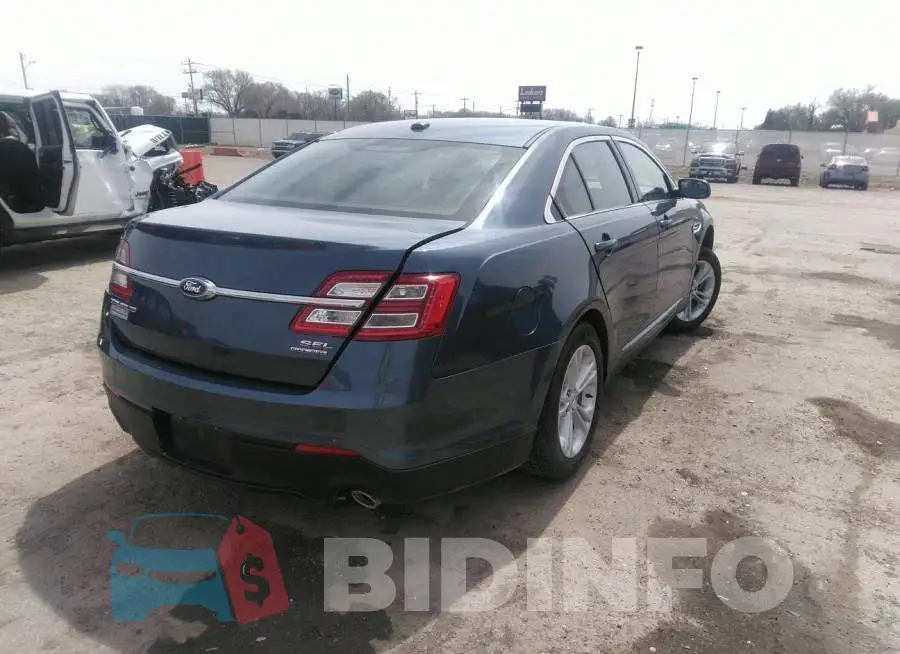 1FAHP2E8XJG129760 Photo# 4