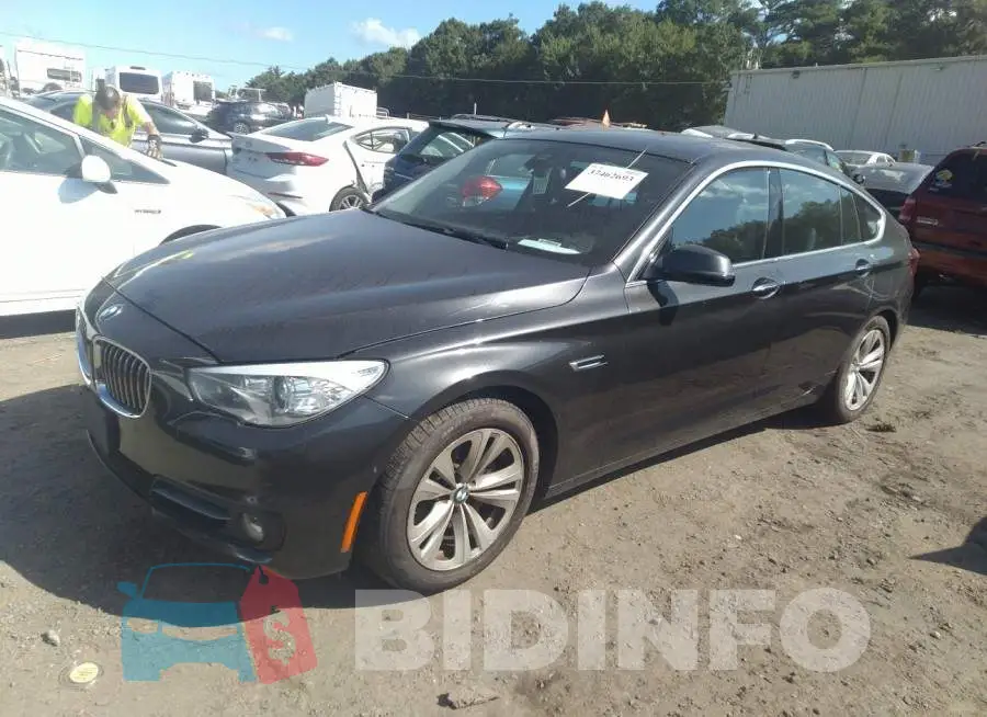 WBA5M4C55FD183970 Photo# 2