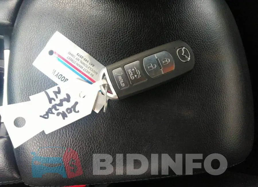 JM1GJ1U52G1425621 Photo# 11