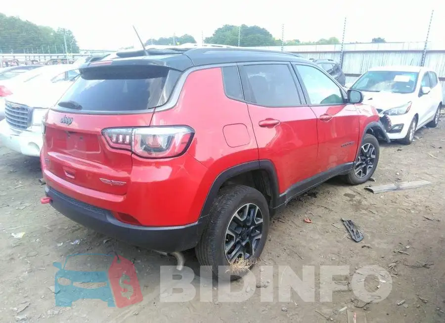 3C4NJDDB9LT145194 Photo# 4