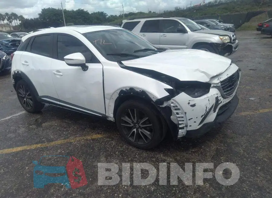JM1DKBD77G0108267 Photo# 1