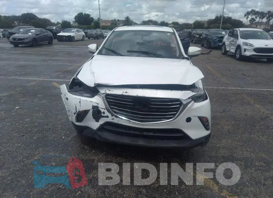 JM1DKBD77G0108267 Photo# 6