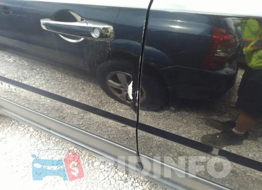1C4NJRBB8GD579554 Photo# 6