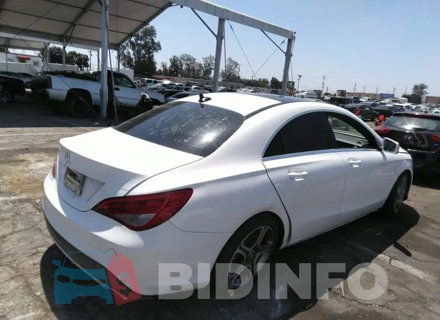 WDDSJ4EB2JN690352 Photo# 4