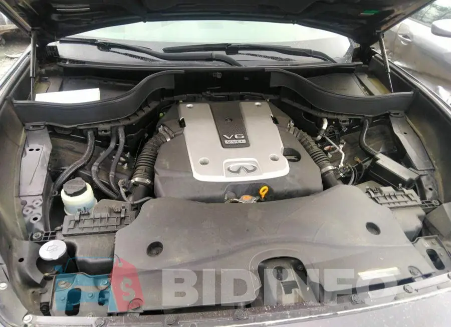 JN8CS1MUXHM144044 Photo# 10
