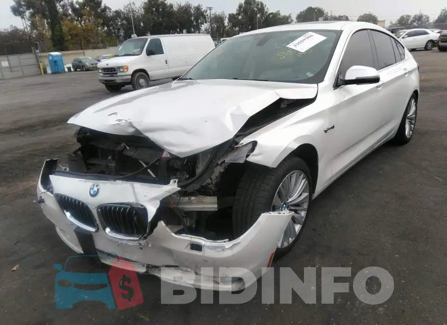 WBA5M2C51FGH99235 Photo# 2