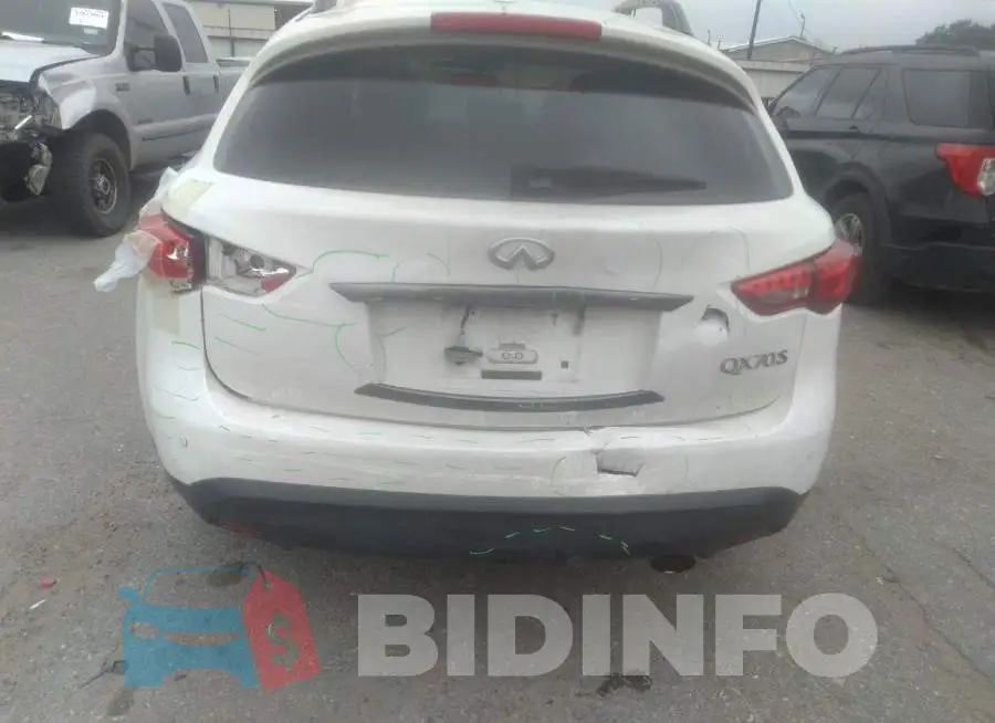 JN8CS1MU0GM671430 Photo# 6