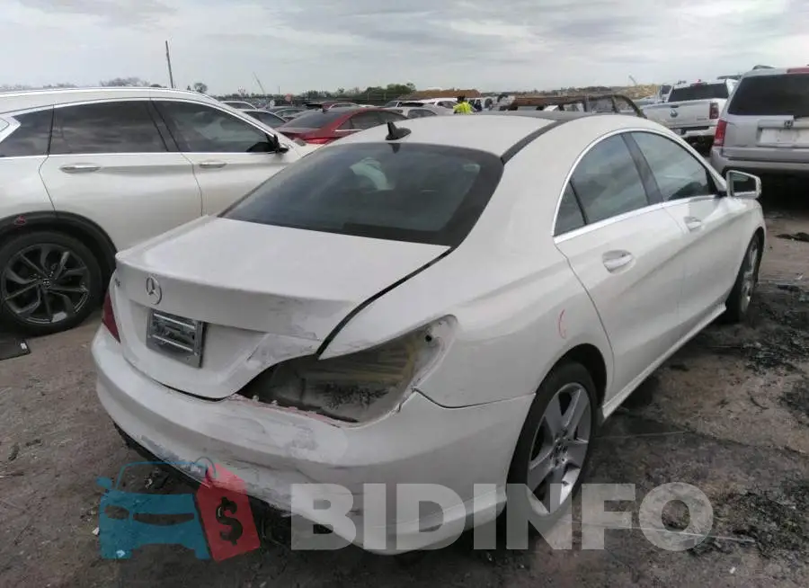 WDDSJ4EB1JN568775 Photo# 6