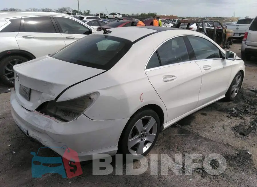 WDDSJ4EB1JN568775 Photo# 4
