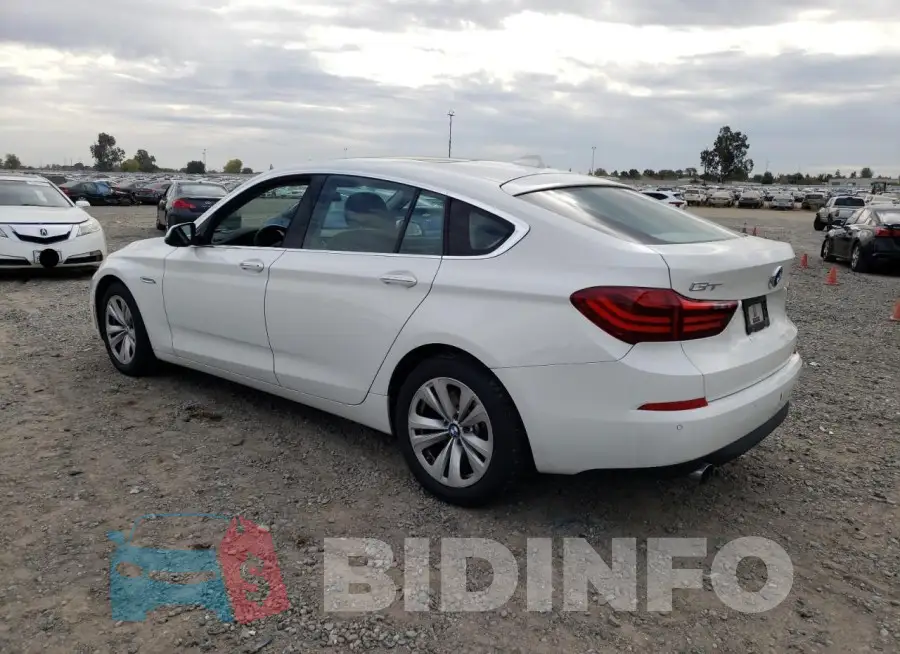 WBA5M2C57FGH99238 Photo# 2