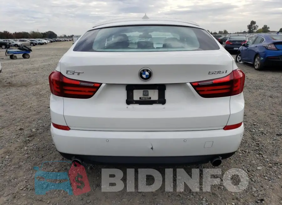 WBA5M2C57FGH99238 Photo# 6