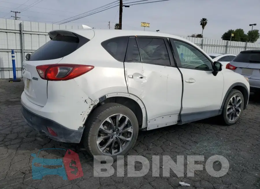 JM3KE4DYXG0789342 Photo# 3