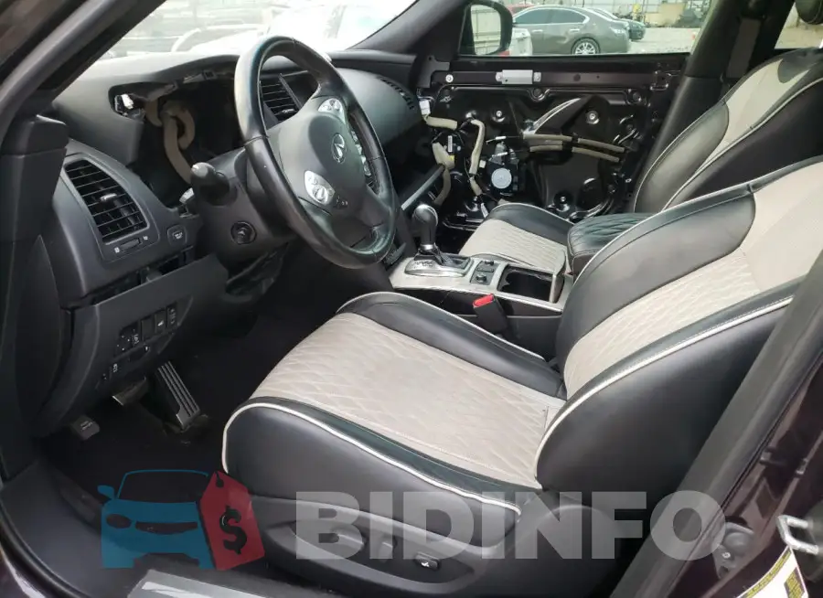 JN8CS1MWXHM410082 Photo# 7