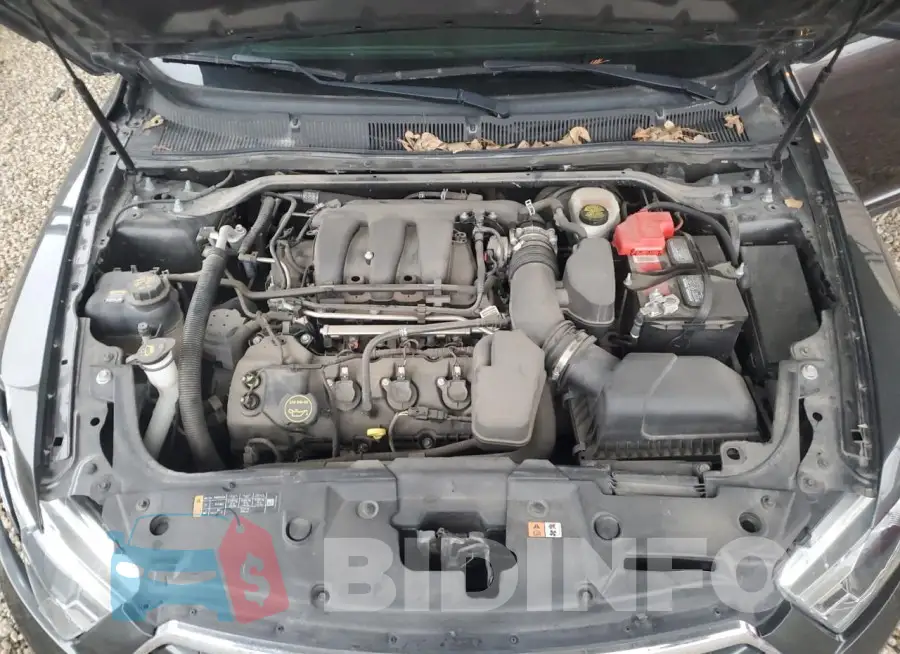 1FAHP2E8XJG136577 Photo# 11