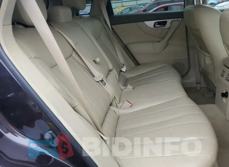 JN8CS1MWXFM481425 Photo# 10