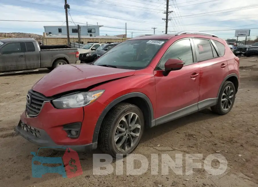 JM3KE4DY0G0919158 Photo# 1