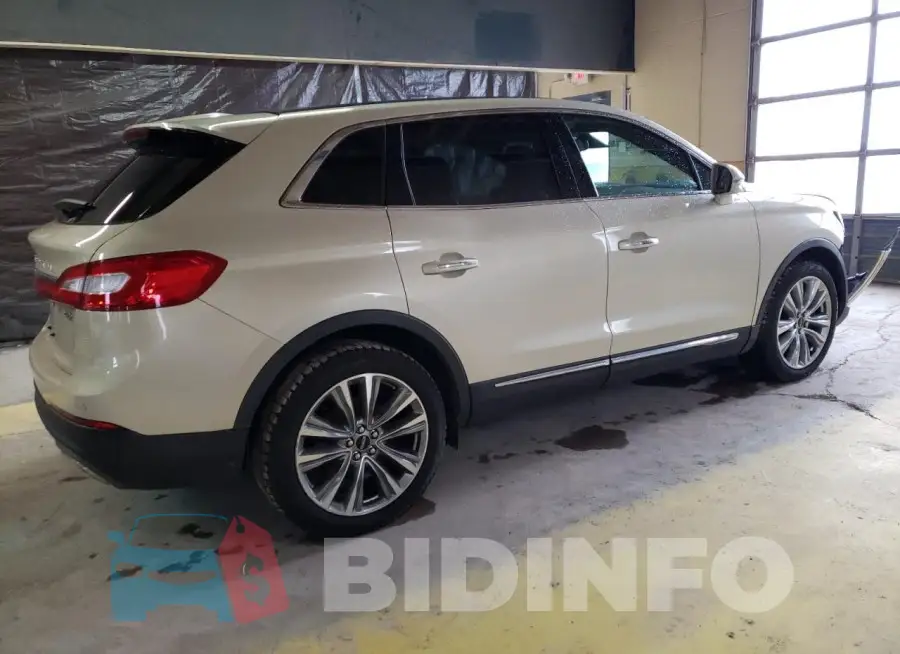 2LMTJ8LP9GBL79266 Photo# 3