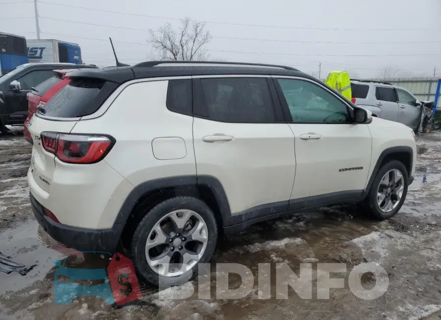 3C4NJDCB4KT767640 Photo# 3