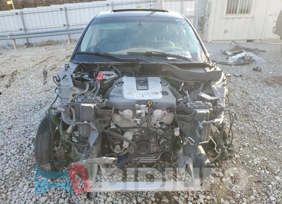 JN8CS1MWXHM415296 Photo# 5