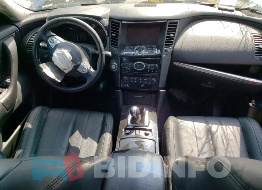 JN8CS1MW1GM400281 Photo# 8